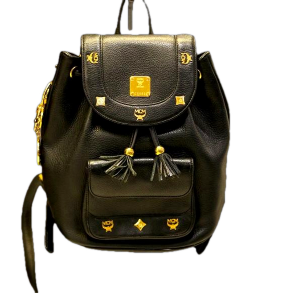 Vintage MCM black backpack w/ golden studded logo motifs & drawstrings